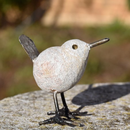 Oiseau pierre et métal